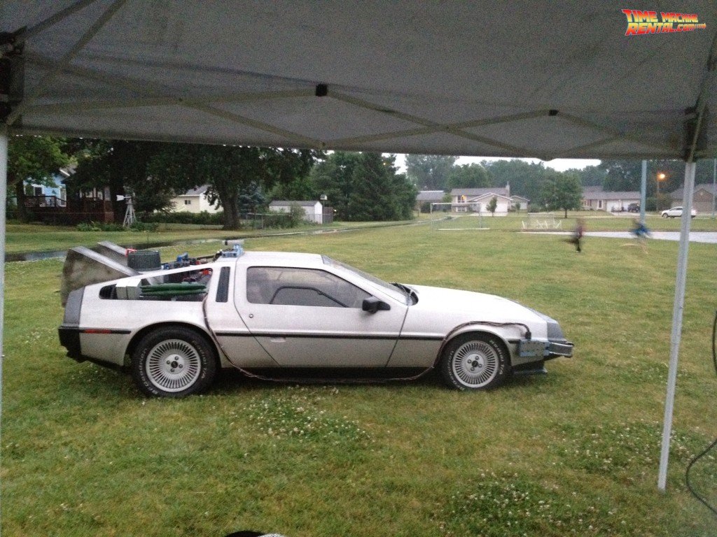 A certain movie car replica reparing for the night time viewing of Back to the Future.