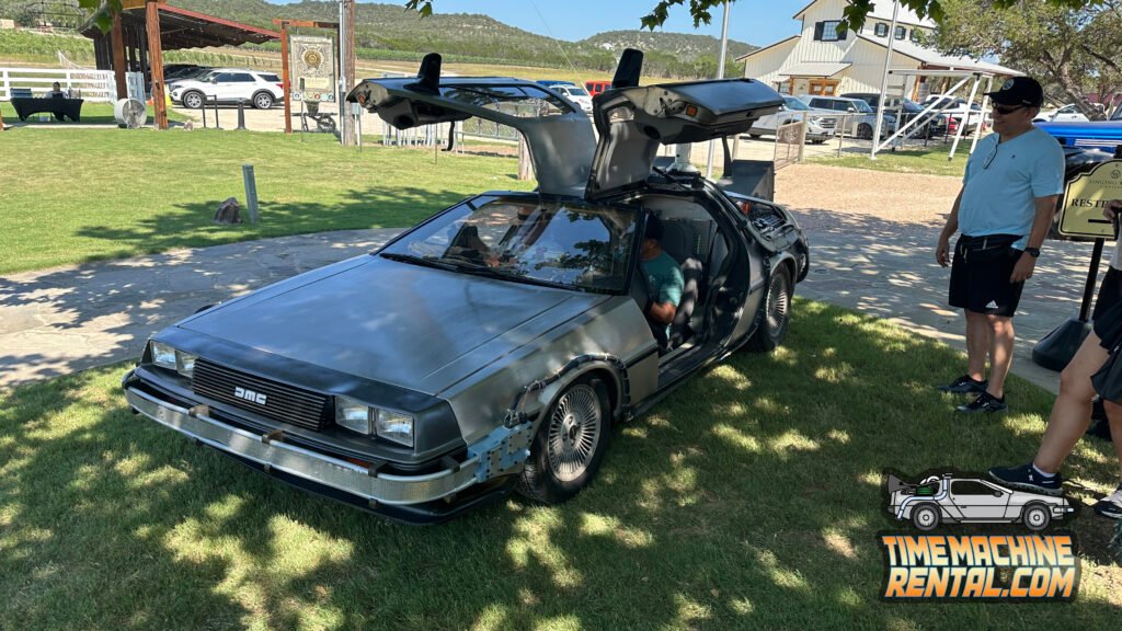 Stunning views, unique buildings, mature oak trees and beautiful sunsets make the Singing Water Vineyards a favorite destination for the Hill Country -- and time travelers hoping to jump into our DeLorean time machine rental.